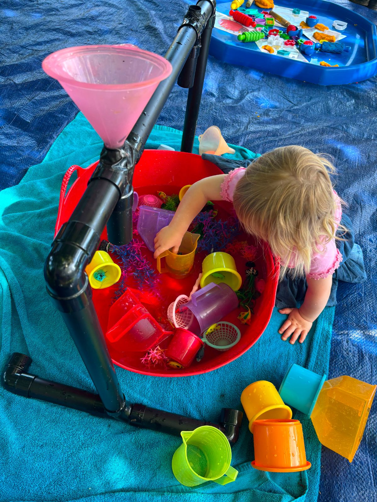 Children enjoying free-flow messy play